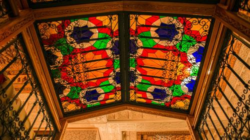 a stained glass window on the ceiling of a room at Palais Zahia Hotel & Spa in Tangier