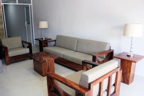 Ein Sitzbereich in der Unterkunft Hotel Tampico Express