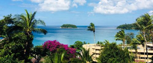 a view of the ocean with islands in the distance at Kata Top Villas in Kata Beach