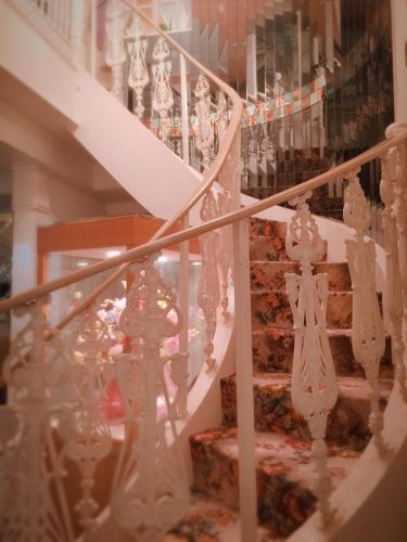 a set of stairs with white stuff on them at Hotel Elegance (Love Hotel) in Karatsu