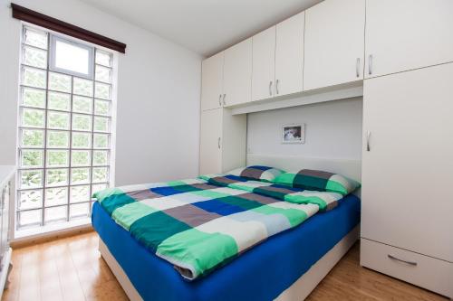 מיטה או מיטות בחדר ב-Apartments Vista