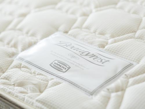 a mattress sitting on top of a bed at Tosei Hotel Cocone Kanda in Tokyo