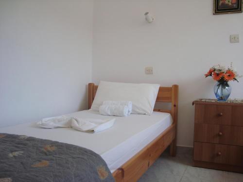 Ένα ή περισσότερα κρεβάτια σε δωμάτιο στο Kappatos Studios & Apartments