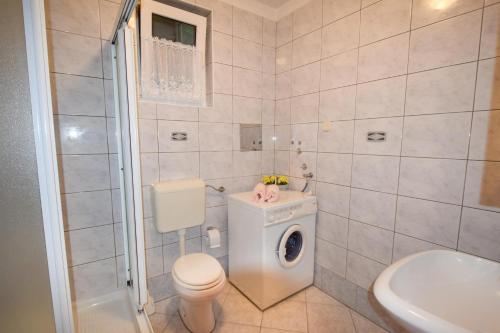 Koupelna v ubytování Apartments & Room Matic