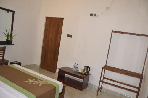 Ένα ή περισσότερα κρεβάτια σε δωμάτιο στο Nice To Meet Home Stay
