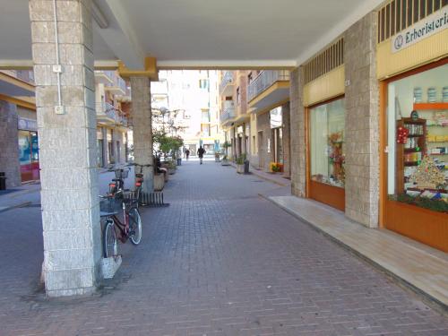 a bike parked on a sidewalk in a building at Mr Jackpot2 in Canelli