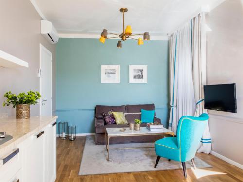  Comfort One-Bedroom Apartment with Balcony and Partial Sea VIew