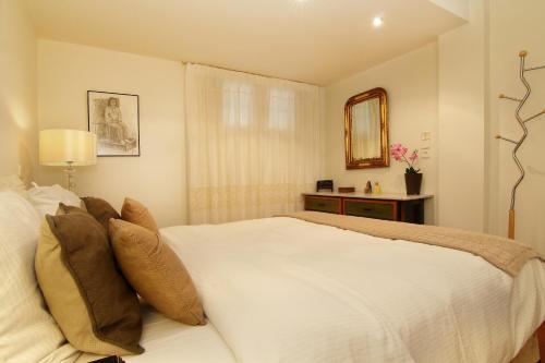 Posteľ alebo postele v izbe v ubytovaní Oasis Pool House by GHH