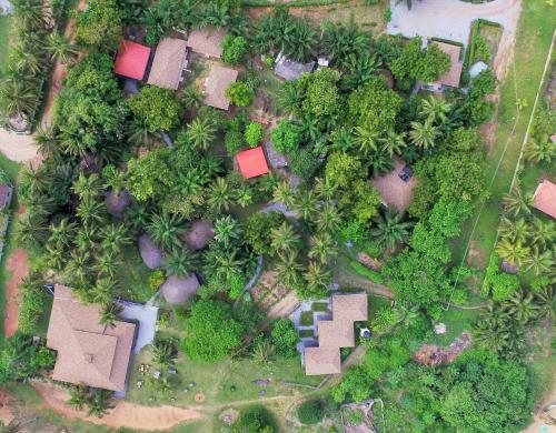 an overhead view of a yard with trees and houses at Ko-Sa Beach Resort Ltd in Ampeni