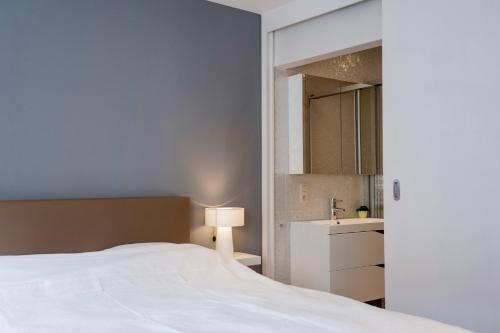 Postel nebo postele na pokoji v ubytování Le Coeur de Durbuy