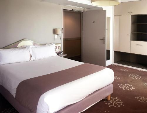 
Cama o camas de una habitación en Hotel Ours Blanc - Wilson
