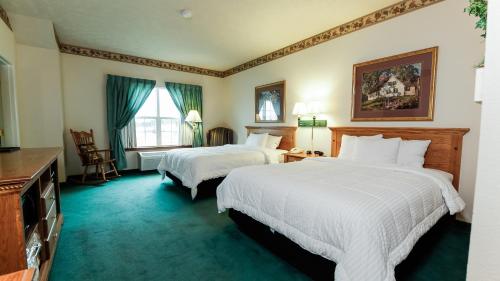 Кровать или кровати в номере Van Buren Hotel
