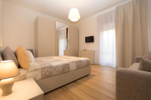 Postel nebo postele na pokoji v ubytování Salerno e le due coste