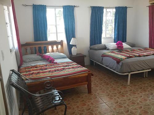 Postel nebo postele na pokoji v ubytování Hotel Contadora