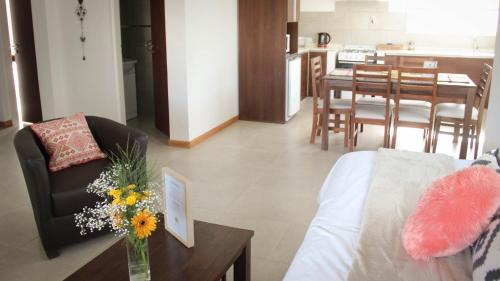 Ένα ή περισσότερα κρεβάτια σε δωμάτιο στο Del Sol Apart Hotel
