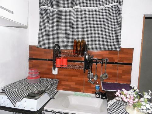 Kuchyň nebo kuchyňský kout v ubytování Nilda Casas e Quartos para Aluguel