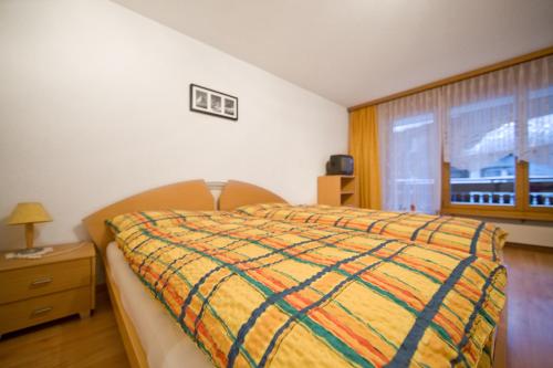 Postel nebo postele na pokoji v ubytování Haus Perelia C