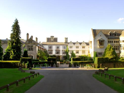a large house with a driveway in front of it at Coombe Abbey Hotel in Coventry