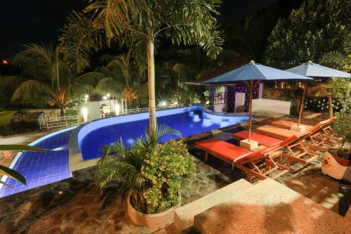 Der Swimmingpool an oder in der Nähe von Nipah Villas