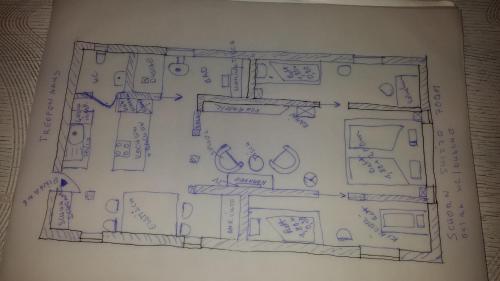 a drawing of a bathroom in a book at Holzwerk Oybin in Kurort Oybin