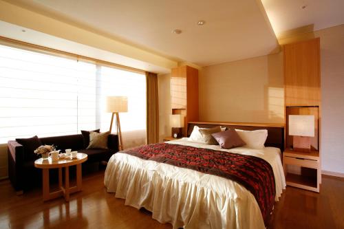 Una cama o camas en una habitación de Onyado Toho