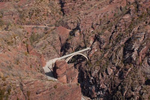a bridge on the side of a mountain at Relais Des Alpes in Guillaumes