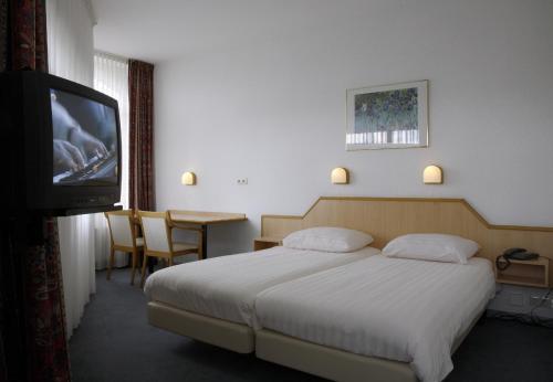 Hotel Dekkersにあるベッド