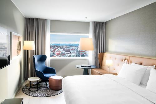 Ένα ή περισσότερα κρεβάτια σε δωμάτιο στο Radisson Blu Atlantic Hotel, Stavanger