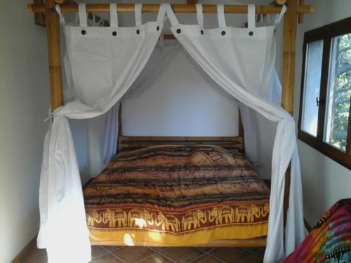 Postel nebo postele na pokoji v ubytování Le gîte des garrigues