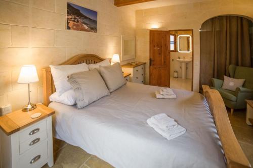 Cama o camas de una habitación en Gozo Spirit