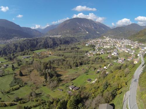 an aerial view of a town in the mountains at Kapriol in Castello Tesino