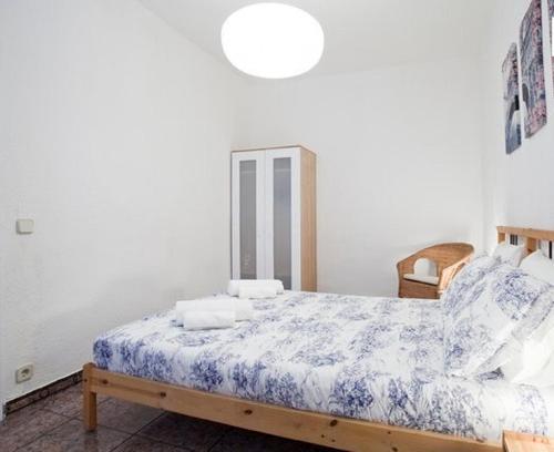 Un pat sau paturi într-o cameră la Melody House