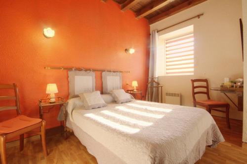 Ένα ή περισσότερα κρεβάτια σε δωμάτιο στο Chambres d'hôtes " Moulin du Couedic "