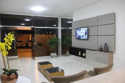TV a/nebo společenská místnost v ubytování Hotel Executive