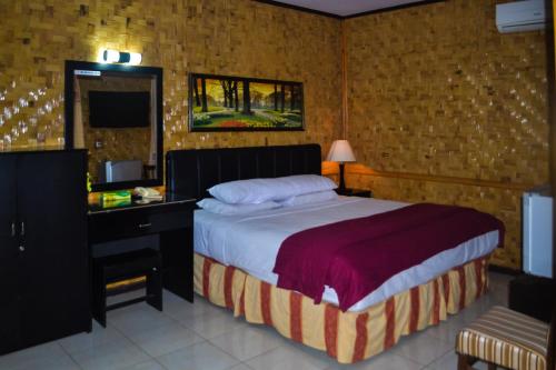 Krevet ili kreveti u jedinici u objektu Hotel Indra Toraja