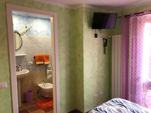 Phòng tắm tại Borgo La Forgia