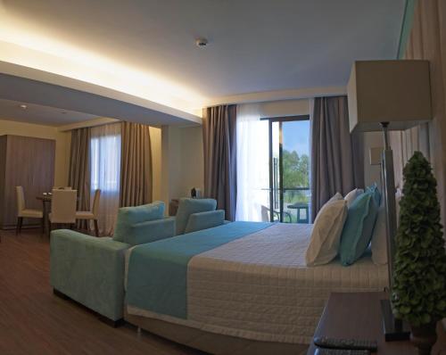 Кровать или кровати в номере Awa Resort Hotel