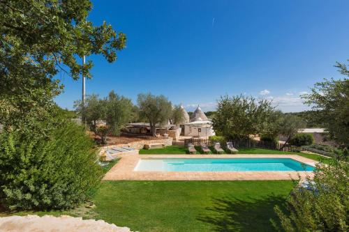 The swimming pool at or close to Trullo Luna by BarbarHouse