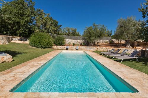 The swimming pool at or close to Trullo Luna by BarbarHouse