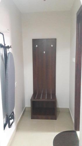 a bathroom with a shower in the corner of a room at Jana Palace Serviced Apartments in Jeddah
