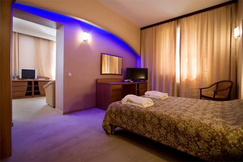 Cama o camas de una habitación en Hotel Chaika