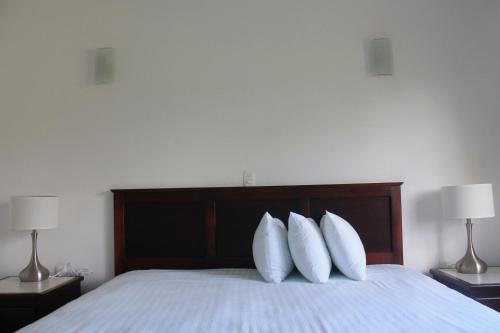 Łóżko lub łóżka w pokoju w obiekcie Real Primaveras Campestre