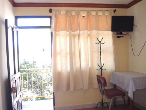 Μια τηλεόραση ή/και κέντρο ψυχαγωγίας στο Hostal Valle Hermoso