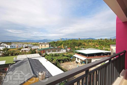 a balcony with a view of a city at Hai Bed and Breakfasts in Taitung City