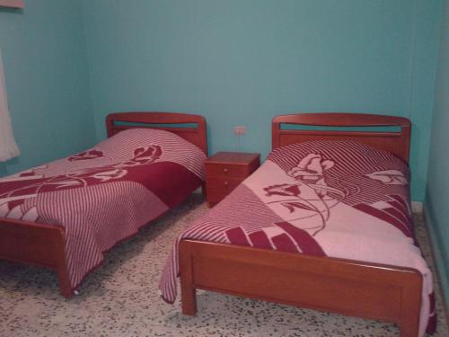 Postel nebo postele na pokoji v ubytování Bauhaus Chalets Apartment