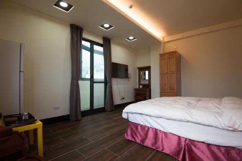 Postel nebo postele na pokoji v ubytování Habitat Heart B&B