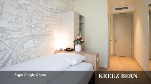 Cama o camas de una habitación en Kreuz Bern Modern City Hotel