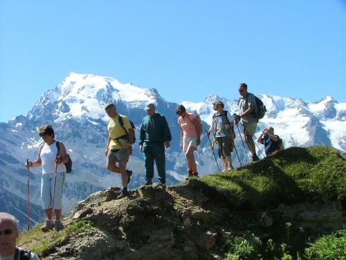 a group of people standing on top of a mountain at Hotel Madatsch in Trafoi