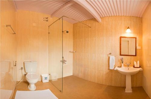 A bathroom at Teanest Nightingale by Nature Resorts