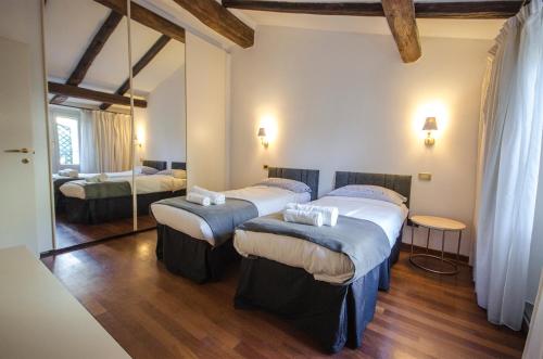 Ένα ή περισσότερα κρεβάτια σε δωμάτιο στο RR 108